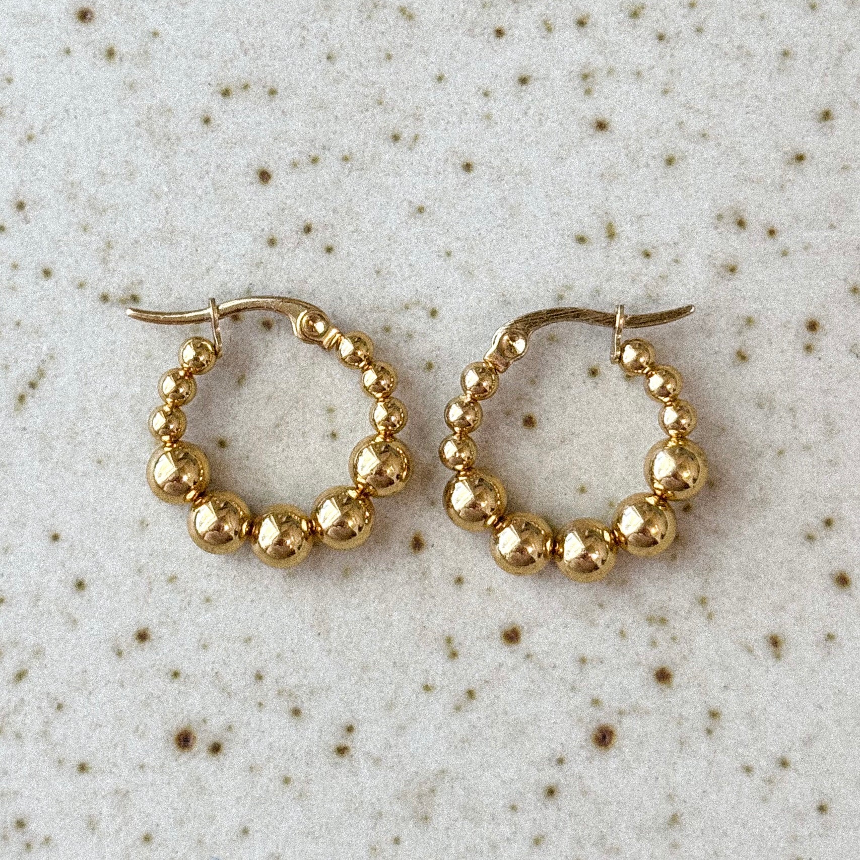 Aretes Santiago